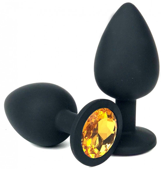 Черная силиконовая анальная пробка с оранжевым стразом - 10,5 см.