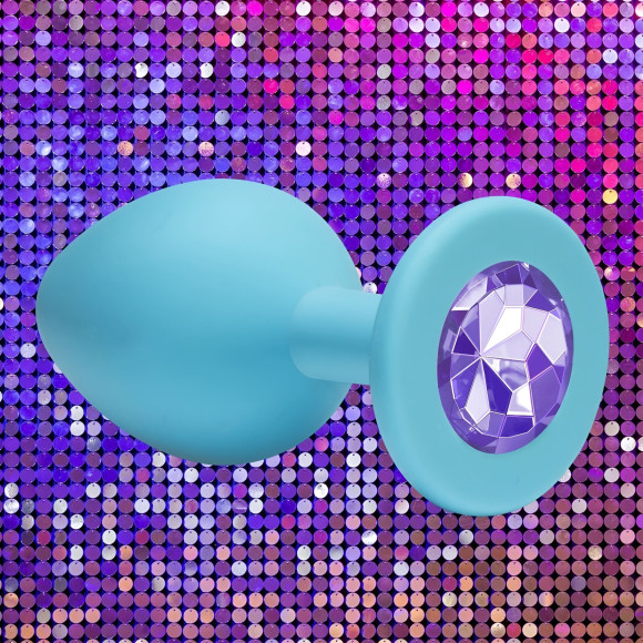 Малая голубая анальная пробка Emotions Cutie Small с фиолетовым кристаллом - 7,5 см. Малая голубая анальная пробка Emotions Cutie Small с фиолетовым кристаллом - 7,5 см.