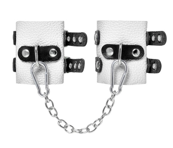 Бело-черные наручники с двумя ремешками и люверсами Бело-черные наручники с двумя ремешками и люверсами
