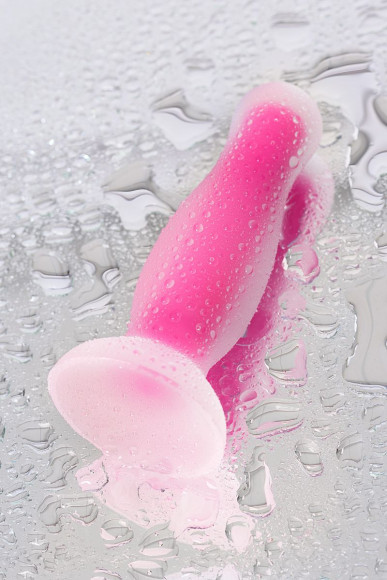 Розовая, светящаяся в темноте анальная втулка Cain Glow - 10 см. Розовая, светящаяся в темноте анальная втулка Cain Glow - 10 см.