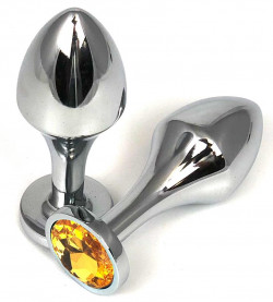 Серебристая анальная пробка на удлиненной ножке с оранжевым кристаллом - 8 см.
