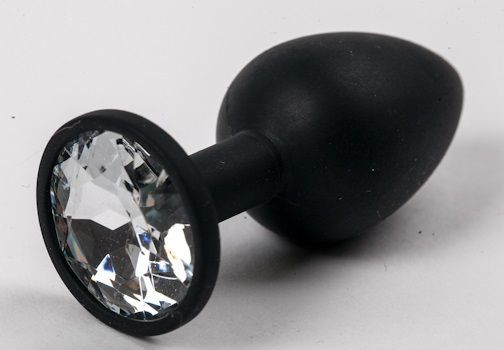 Черная силиконовая анальная пробка с прозрачным стразом - 7,1 см. Черная силиконовая анальная пробка с прозрачным стразом - 7,1 см.